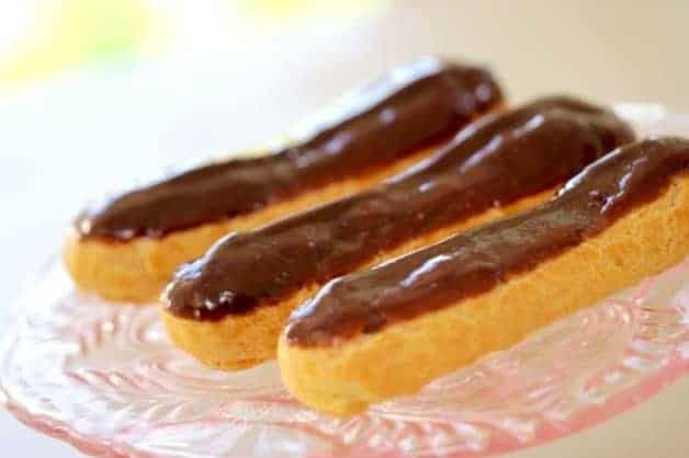 Chocolate Eclair Recipe baked and made served on a glass plate