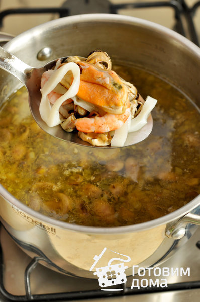 Сливочный суп с морепродуктами фото к рецепту 7