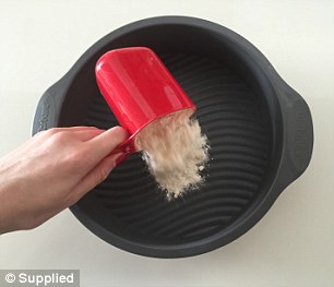 Simple: To start, flour, cocoa powder, salt and sugar is added to a small nine-inch round pan