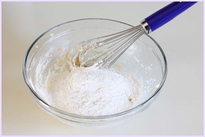 Eggless Chocolate Chip Cookies (BEST Eggless Cookies) dry ingredients to butter, sugar mixture