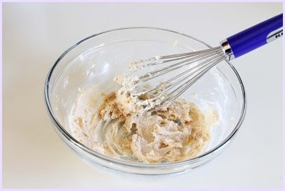 Eggless Chocolate Chip Cookies (BEST Eggless Cookies) add milk and vanilla to the mixture
